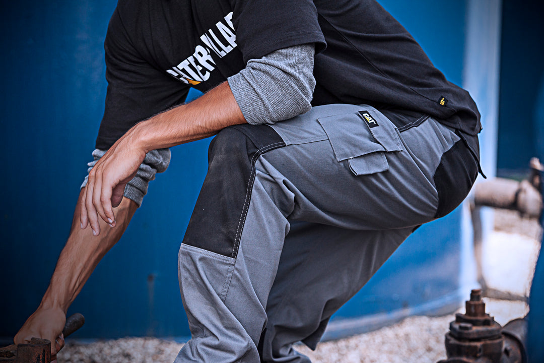 An image of Caterpillar Clothing Brand work trousers and T shirt