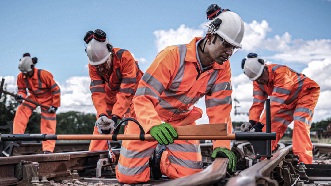 An image of Rail Spec being worn by models on railway site