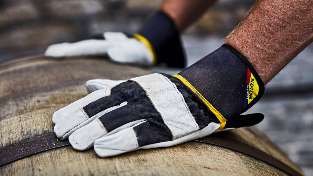 Worker wearing work gloves