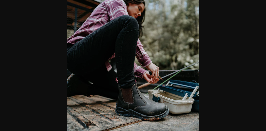 Model wearing Hard Yakka Boots