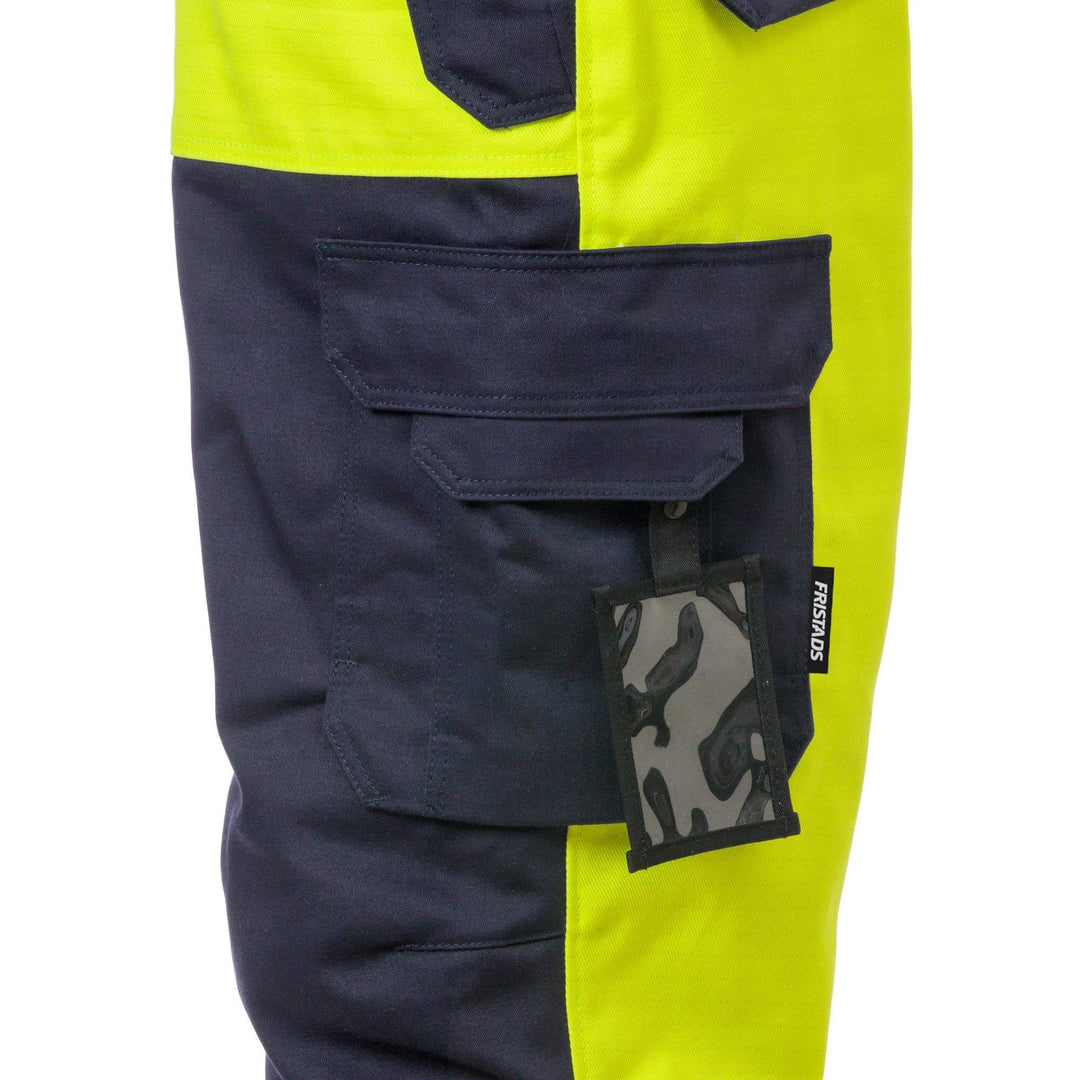 Fristads Flame Retardant Arc and Multi-Protective Hi-Vis Insulated Winter Trousers Class 2 - 2588 FLAM Hi-Vis Yellow/Navy Detail2#colour_hi-vis-yellow-navy