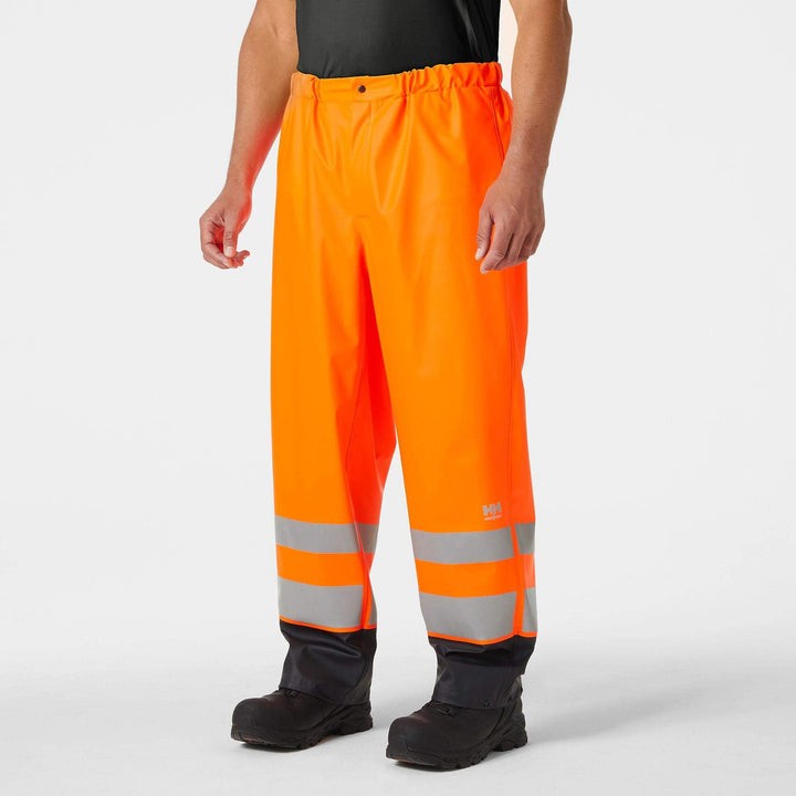 Helly Hansen Addvis Hi-Vis Waterproof Rain Trousers Orange/Ebony OnBody 1#colour_orange-ebony