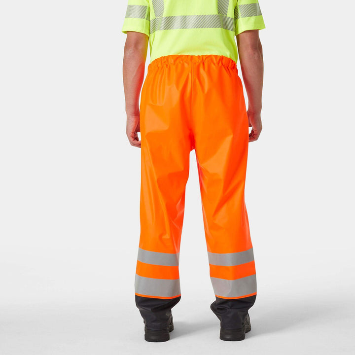 Helly Hansen Addvis Hi-Vis Waterproof Rain Trousers Orange/Ebony OnBody 2#colour_orange-ebony