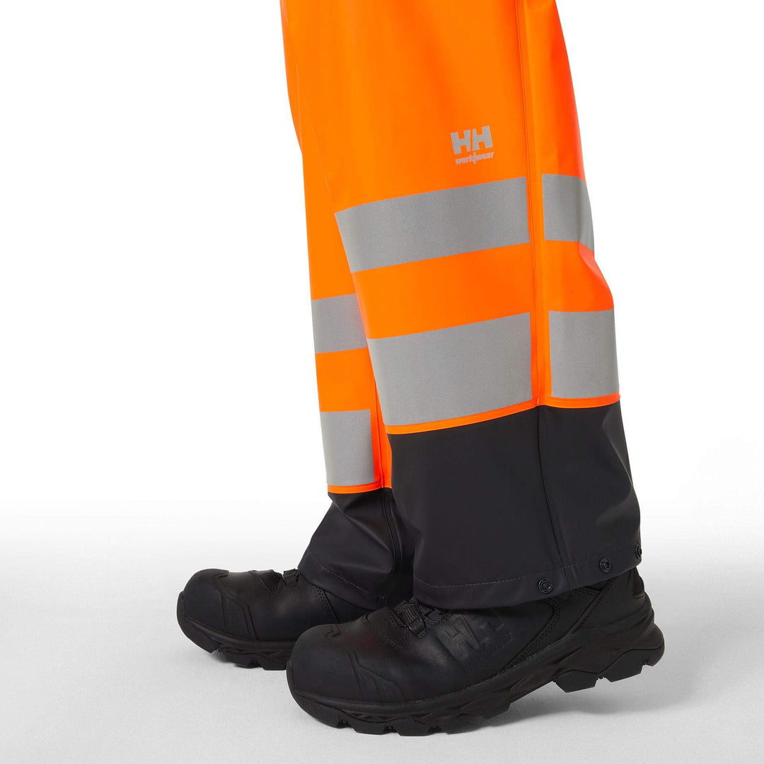 Helly Hansen Addvis Hi-Vis Waterproof Rain Trousers Orange/Ebony Feature 1#colour_orange-ebony