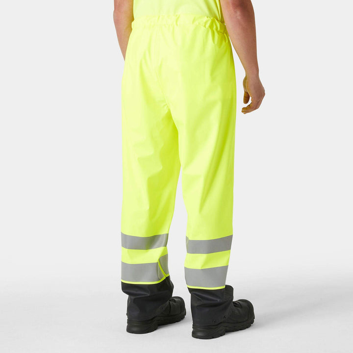 Helly Hansen Addvis Hi-Vis Waterproof Rain Trousers Yellow/Ebony OnBody 2#colour_yellow-ebony