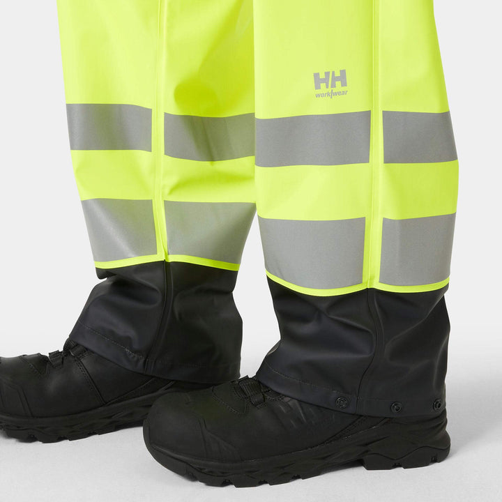 Helly Hansen Addvis Hi-Vis Waterproof Rain Trousers Yellow/Ebony Feature 1#colour_yellow-ebony
