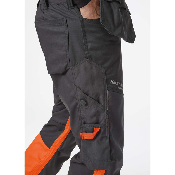 Helly Hansen Alna 2.0 Hi Vis Construction Stretch Trousers Class 1 Orange/Ebony 6 Feature 2#colour_orange-ebony