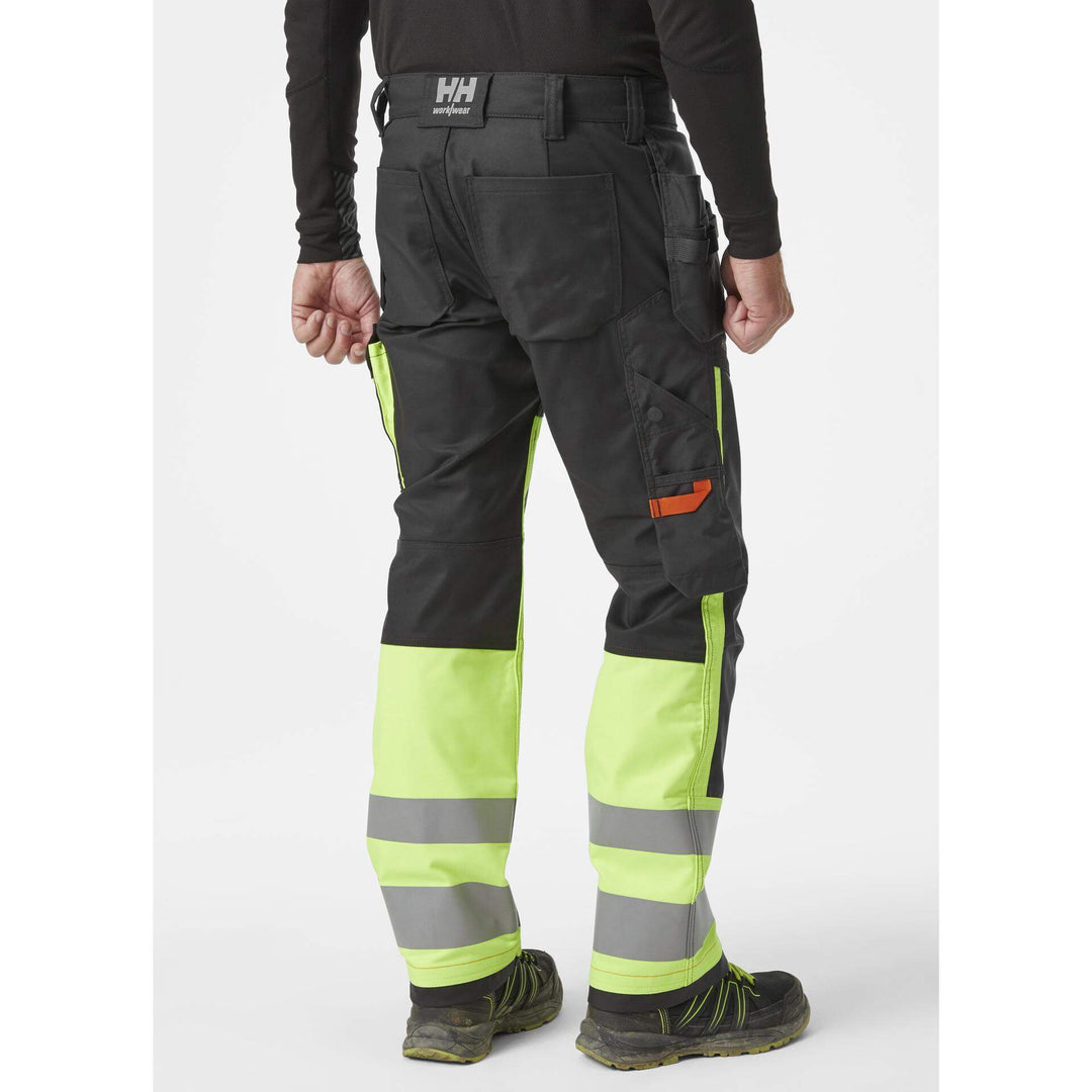 Helly Hansen Alna 2.0 Hi Vis Construction Stretch Trousers Class 1 Yellow/Ebony 4 On Body 2#colour_yellow-ebony