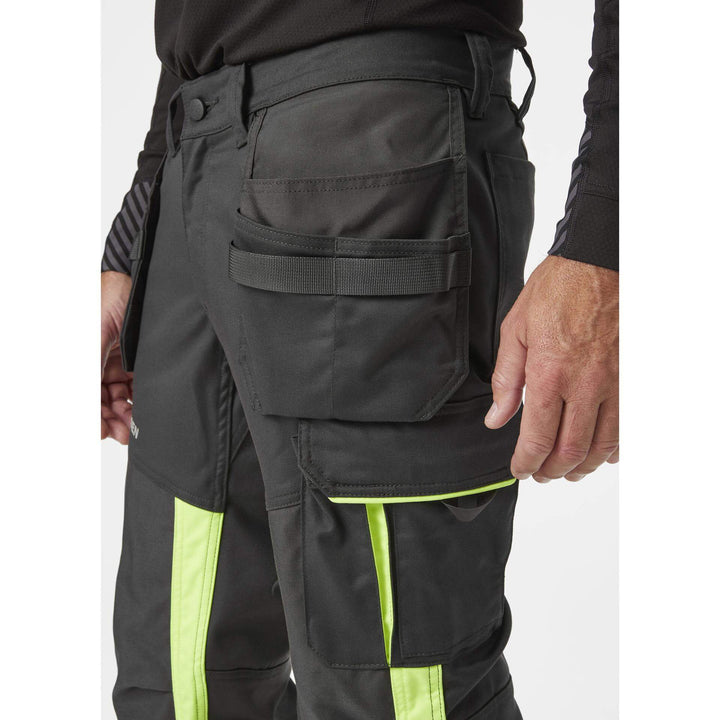 Helly Hansen Alna 2.0 Hi Vis Construction Stretch Trousers Class 1 Yellow/Ebony 5 Feature 1#colour_yellow-ebony