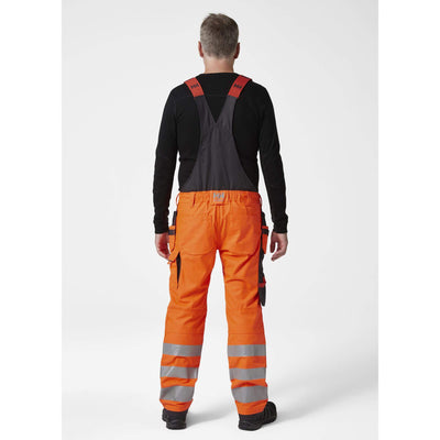 Helly Hansen Alna 2.0 Hi Vis Stretch Construction Bib and Brace Pants Orange/Ebony 4 On Body 2#colour_orange-ebony