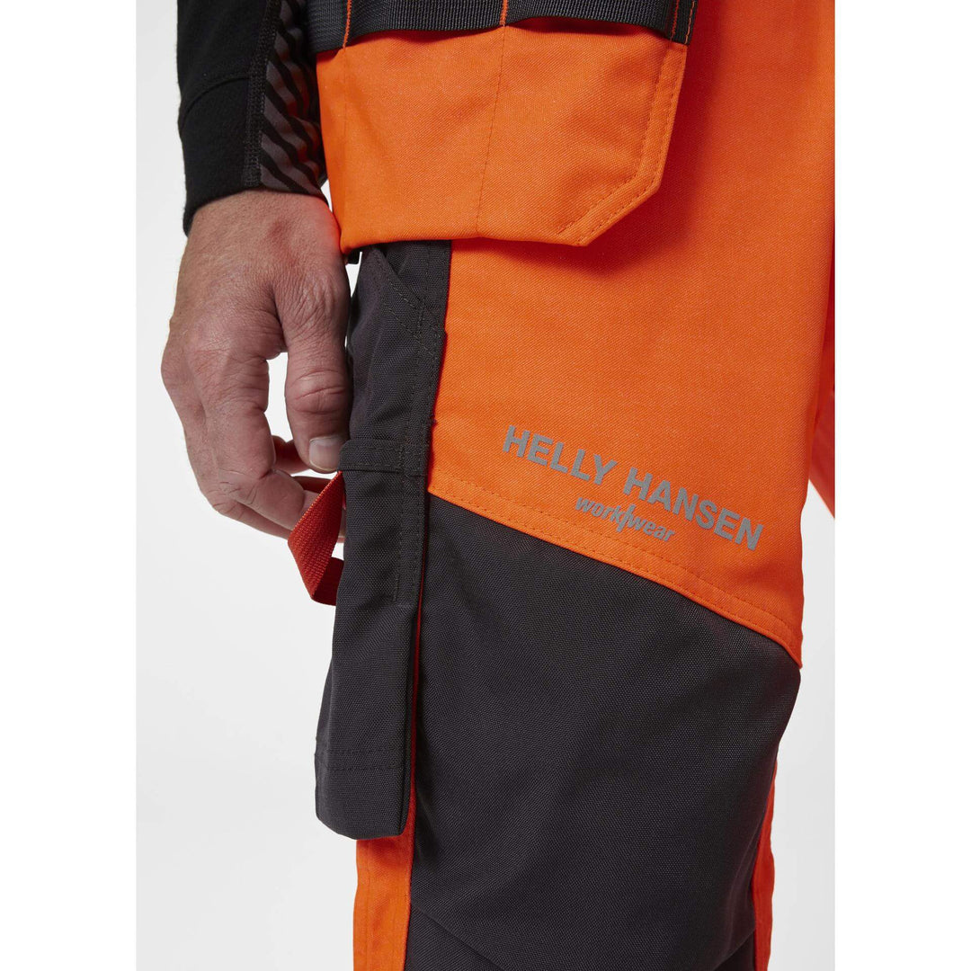 Helly Hansen Alna 2.0 Hi Vis Stretch Construction Bib and Brace Pants Orange/Ebony 7 Feature 3#colour_orange-ebony