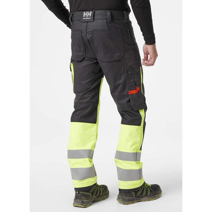 Helly Hansen Alna 2.0 Hi Vis Stretch Work Trousers Class 1 Yellow/Ebony 4 On Body 2#colour_yellow-ebony