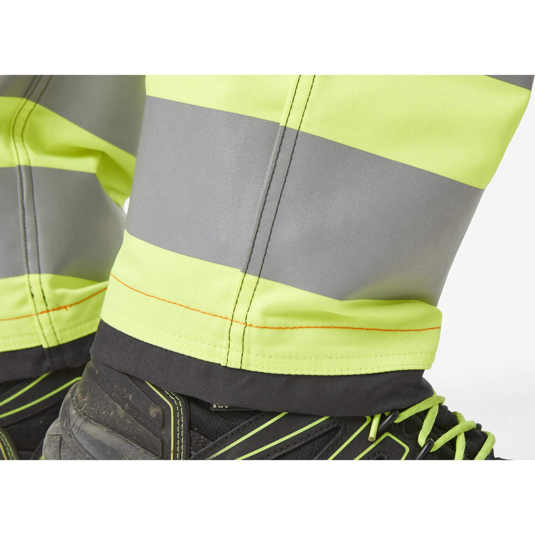 Helly Hansen Alna 2.0 Hi Vis Stretch Work Trousers Class 1 Yellow/Ebony 7 Feature 3#colour_yellow-ebony