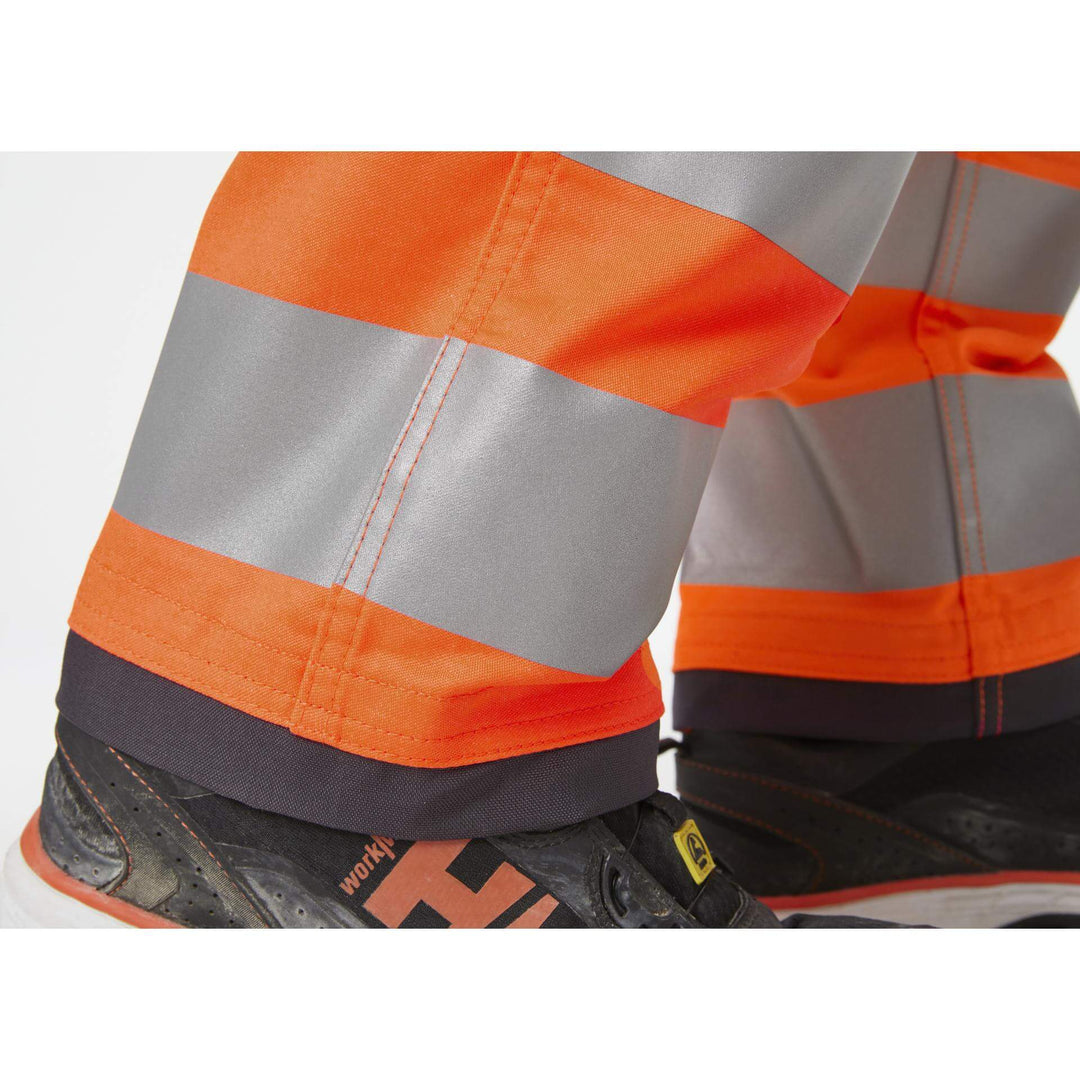 Helly Hansen Alna 2.0 Hi Vis Stretch Work Trousers Class 2 Orange/Ebony 7 Feature 3#colour_orange-ebony