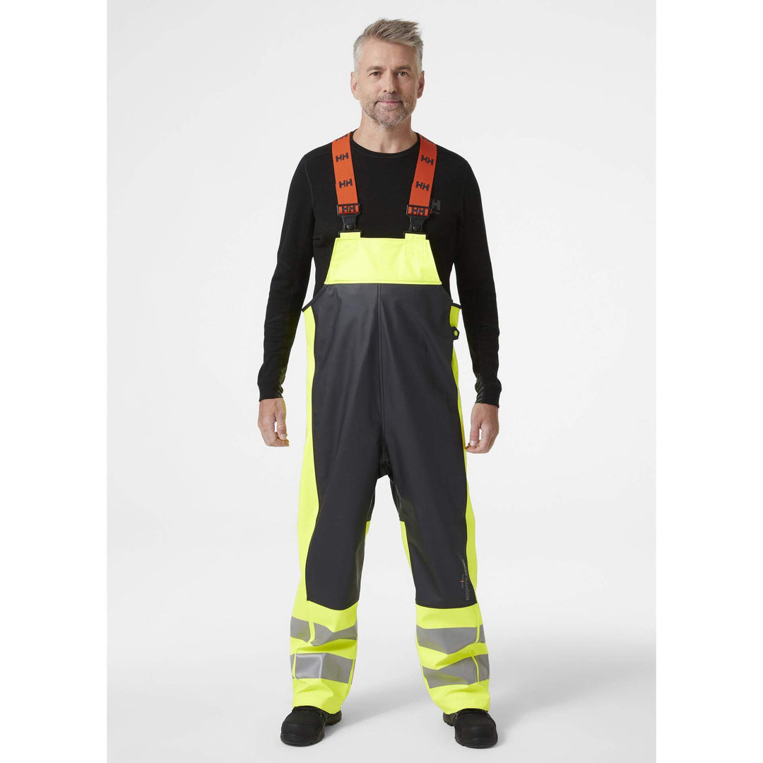 Helly Hansen Alna 2.0 Hi Vis Waterproof Rain Bib and Brace Overalls Yellow/Ebony 3 On Body 1#colour_yellow-ebony