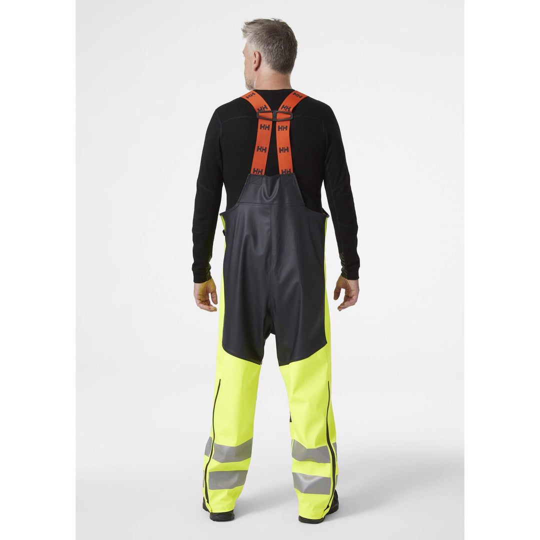 Helly Hansen Alna 2.0 Hi Vis Waterproof Rain Bib and Brace Overalls Yellow/Ebony 4 On Body 2#colour_yellow-ebony