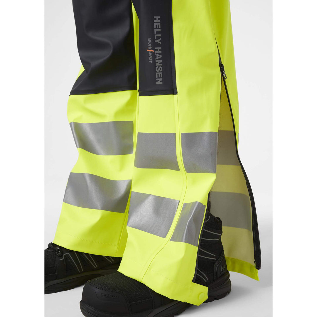 Helly Hansen Alna 2.0 Hi Vis Waterproof Rain Bib and Brace Overalls Yellow/Ebony 5 Feature 1#colour_yellow-ebony