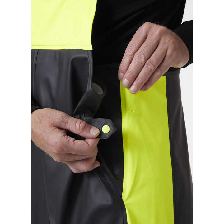 Helly Hansen Alna 2.0 Hi Vis Waterproof Rain Bib and Brace Overalls Yellow/Ebony 6 Feature 2#colour_yellow-ebony