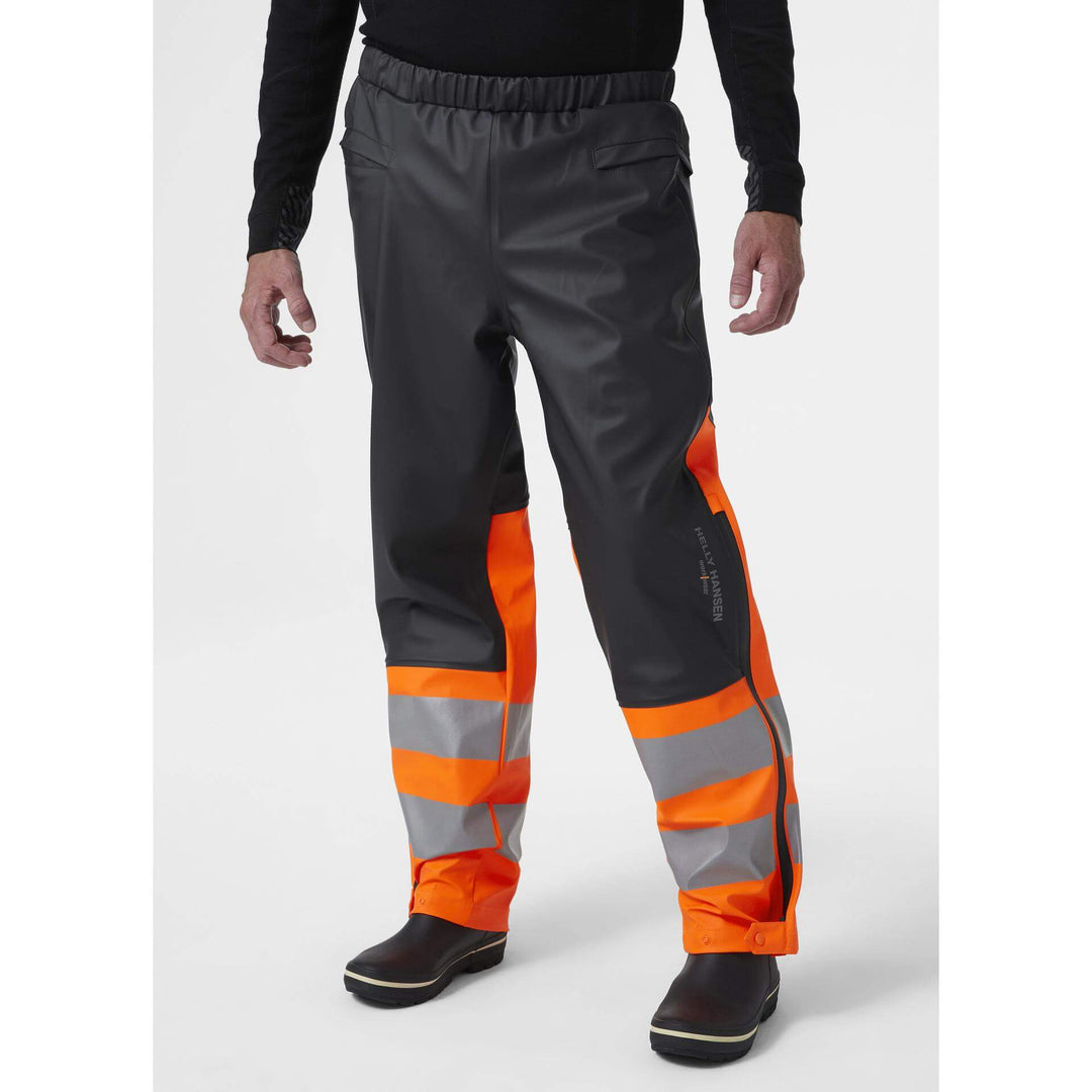 Helly Hansen Alna 2.0 Hi Vis Waterproof Rain Work Trousers Orange/Ebony 3 On Body 1#colour_orange-ebony