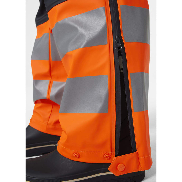 Helly Hansen Alna 2.0 Hi Vis Waterproof Rain Work Trousers Orange/Ebony 5 Feature 1#colour_orange-ebony