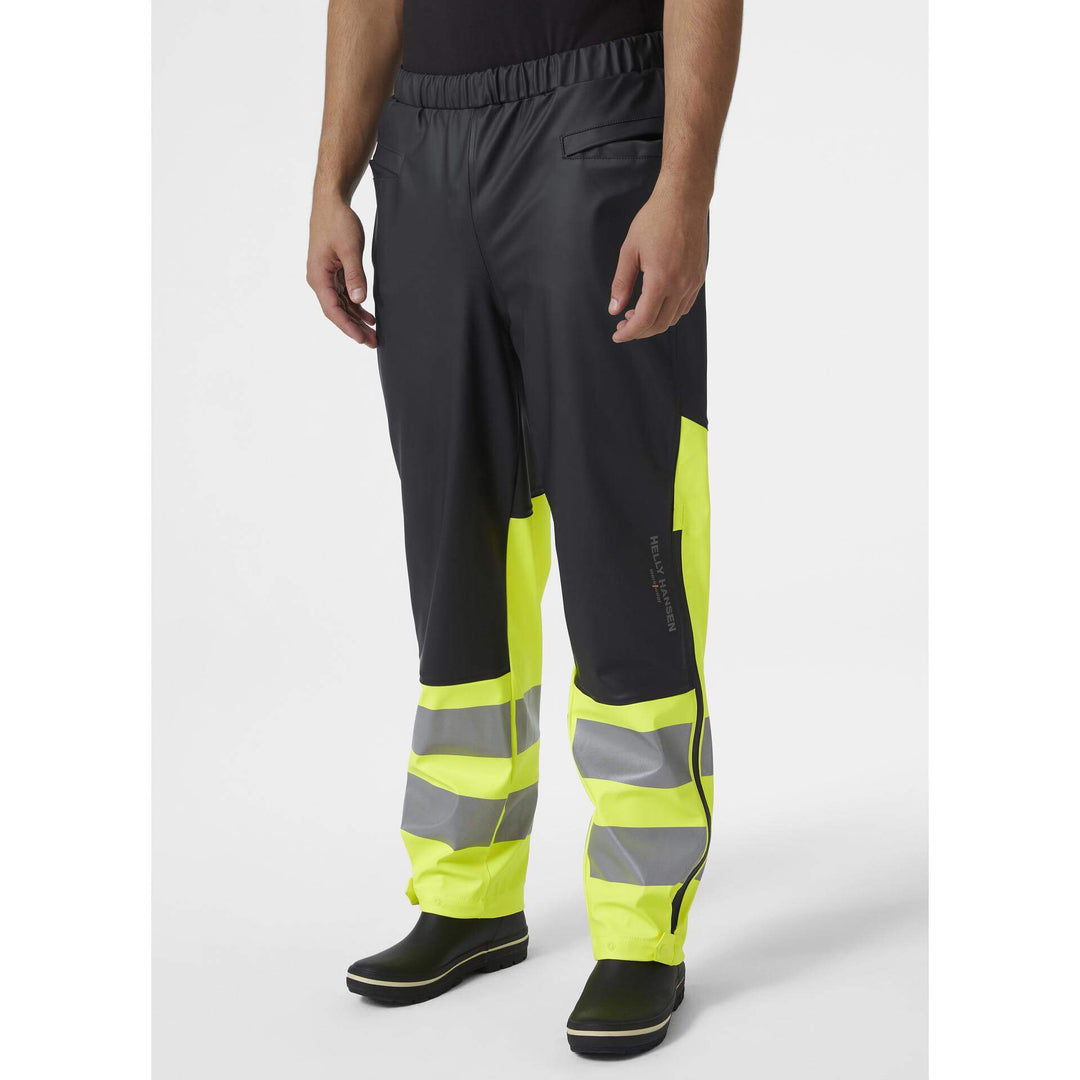 Helly Hansen Alna 2.0 Hi Vis Waterproof Rain Work Trousers Yellow/Ebony 3 On Body 1#colour_yellow-ebony