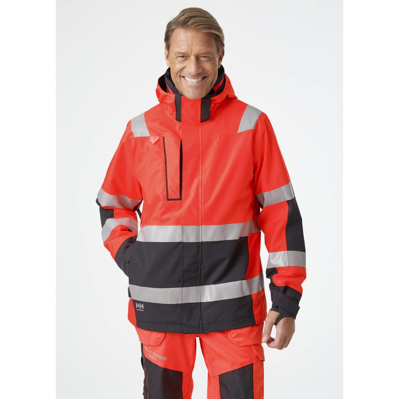 Helly Hansen Alna 2.0 Hi Vis Waterproof Shell Jacket Red/Ebony 1 On Body 1#colour_red-ebony