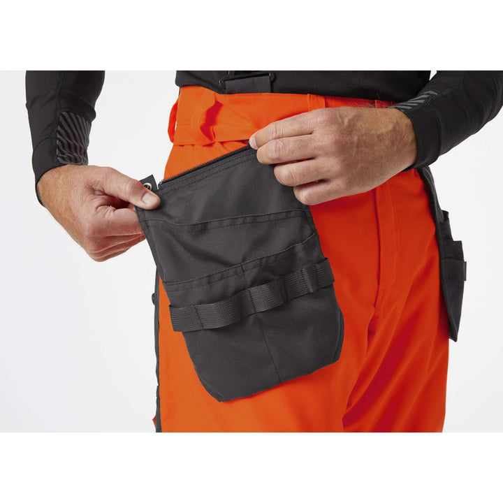 Helly Hansen Alna 2.0 Hi Vis Winter Insulated Construction Bib and Brace Trousers Class 2 Orange/Ebony 5 Feature 1#colour_orange-ebony