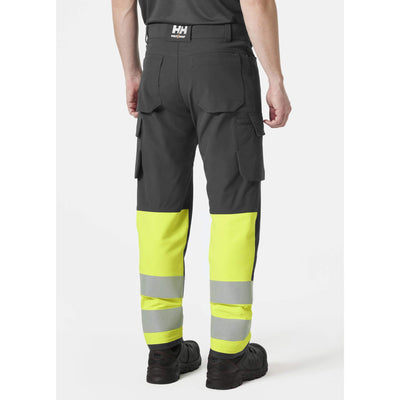 Helly Hansen Alna 4X Hi-Vis 4-Way-Stretch Cargo Trousers Class 1 Yellow/Ebony OnBody 2#colour_yellow-ebony