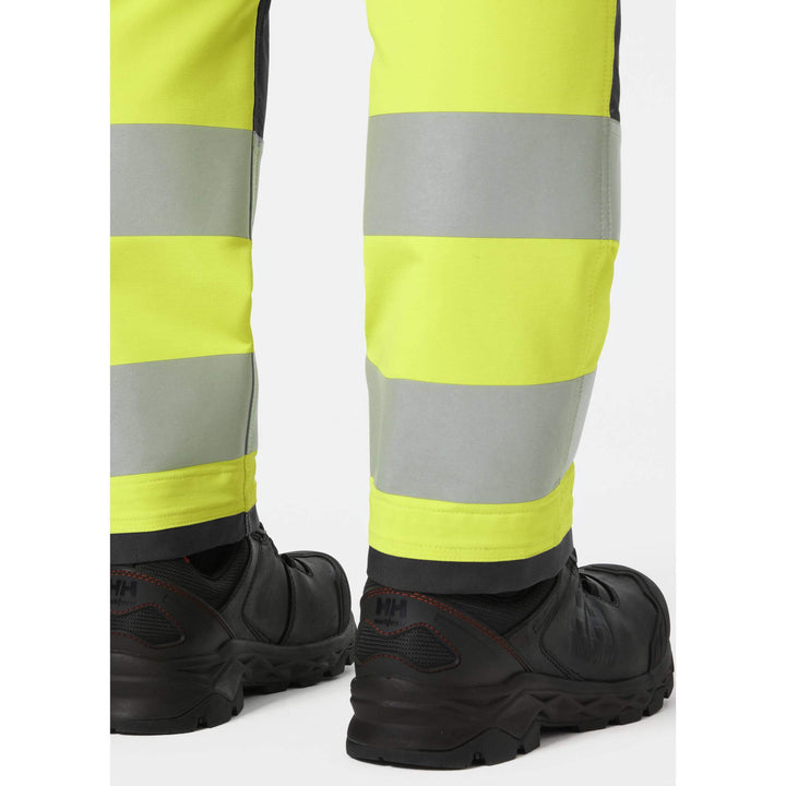 Helly Hansen Alna 4X Hi-Vis 4-Way-Stretch Cargo Trousers Class 1 Yellow/Ebony Feature 2#colour_yellow-ebony