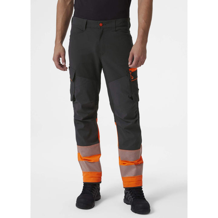 Helly Hansen ICU BRZ Hi Vis Service Work Trousers Class 1 Orange/Ebony 3 On Body 1#colour_orange-ebony