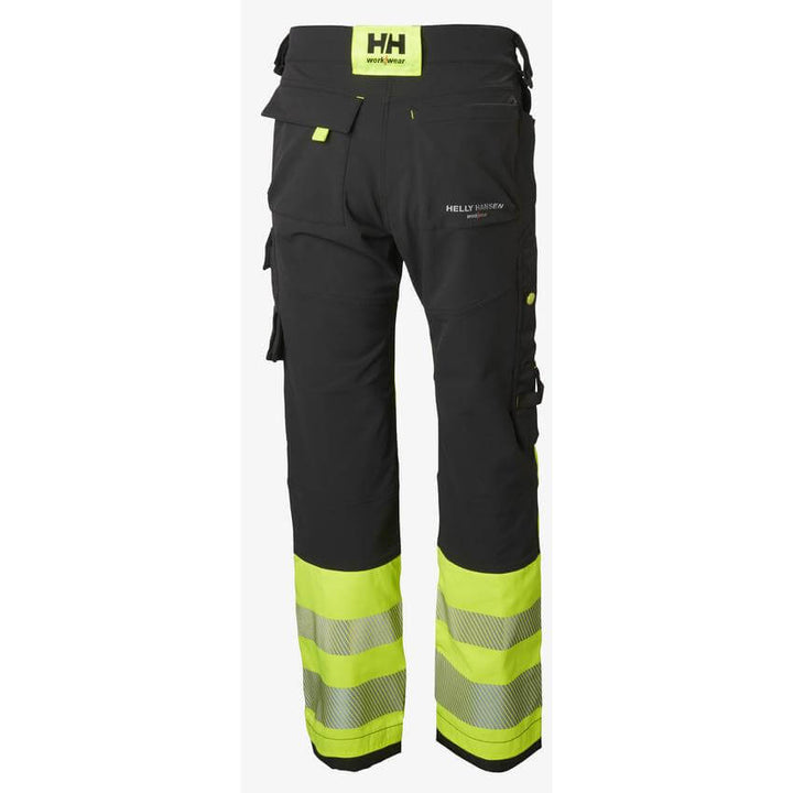 Helly Hansen ICU Hi Vis Construction Stretch Work Trousers Class 1 Yellow/Ebony 2 Rear #colour_yellow-ebony