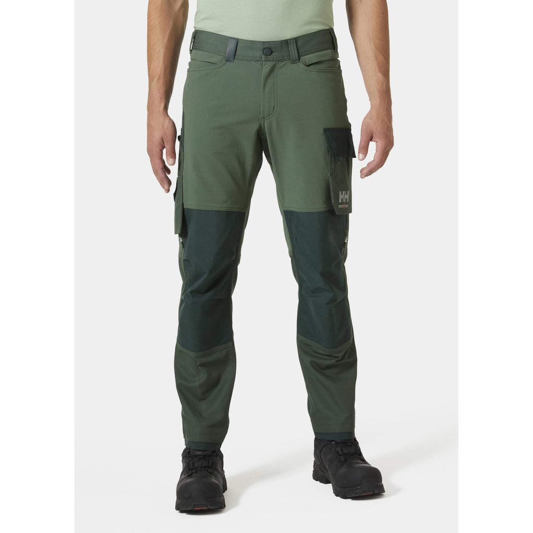 Helly Hansen Oxford 4X HH Connect Lightweight Stretch Work Pants Spruce/Darkest Spruce OnBody 1#colour_spruce-darkest-spruce