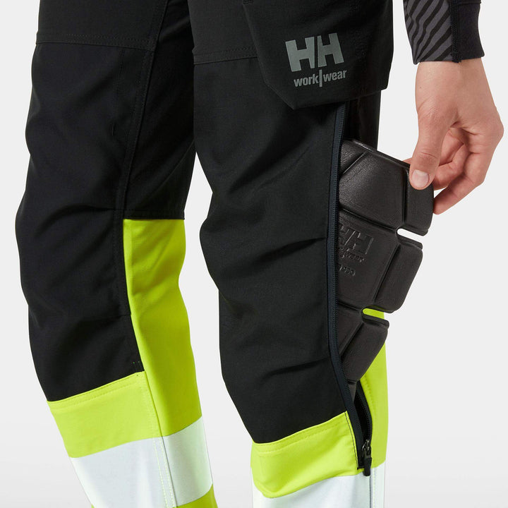 Helly Hansen Womens Alna 4X Hi-Vis 4-Way-Stretch Maternity Work Trousers Class 1 Yellow/Ebony Feature 4#colour_yellow-ebony