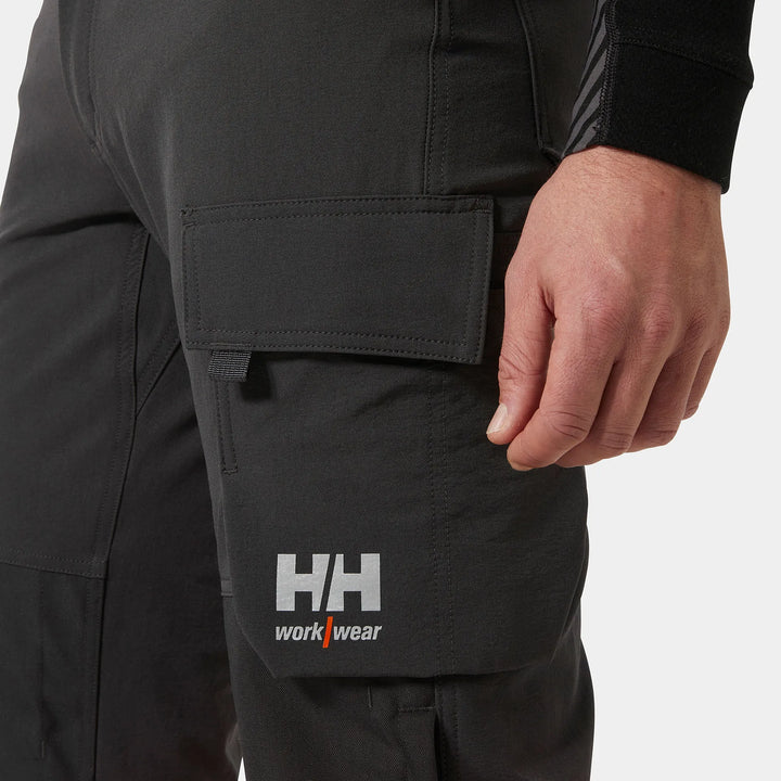 Helly Hansen Alna 4X HH Connect Hi-Vis Class 1 Cordura Reinforced 4-Way-Stretch Trousers 77340 Orange/Ebony — Product Detail 