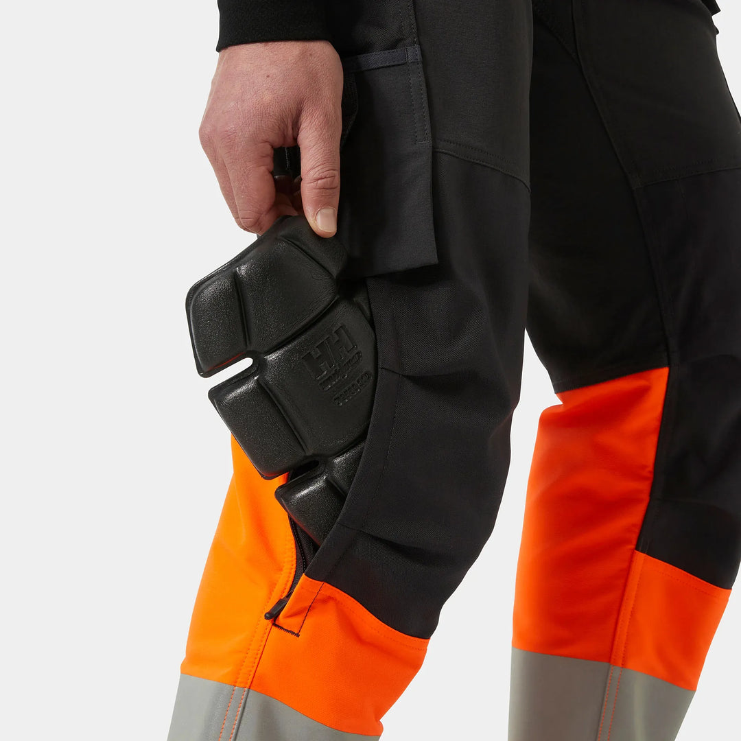 Helly Hansen Alna 4X HH Connect Hi-Vis Class 1 Cordura Reinforced 4-Way-Stretch Trousers 77340 Orange/Ebony — Product Detail 