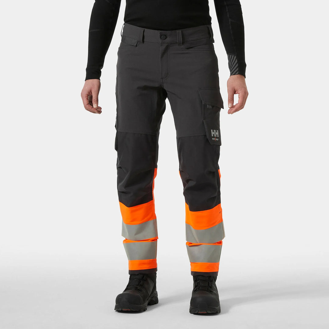 Helly Hansen Alna 4X HH Connect Hi-Vis Class 1 Cordura Reinforced 4-Way-Stretch Trousers 77340 Orange/Ebony — Worn on Site 