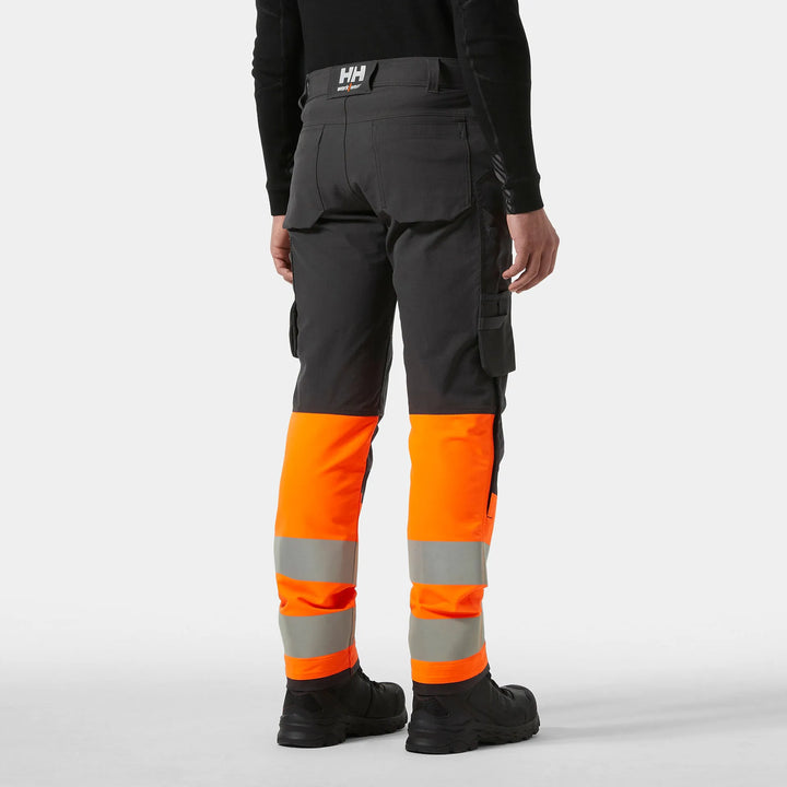 Helly Hansen Alna 4X HH Connect Hi-Vis Class 1 Cordura Reinforced 4-Way-Stretch Trousers 77340 Orange/Ebony — Worn on Site 