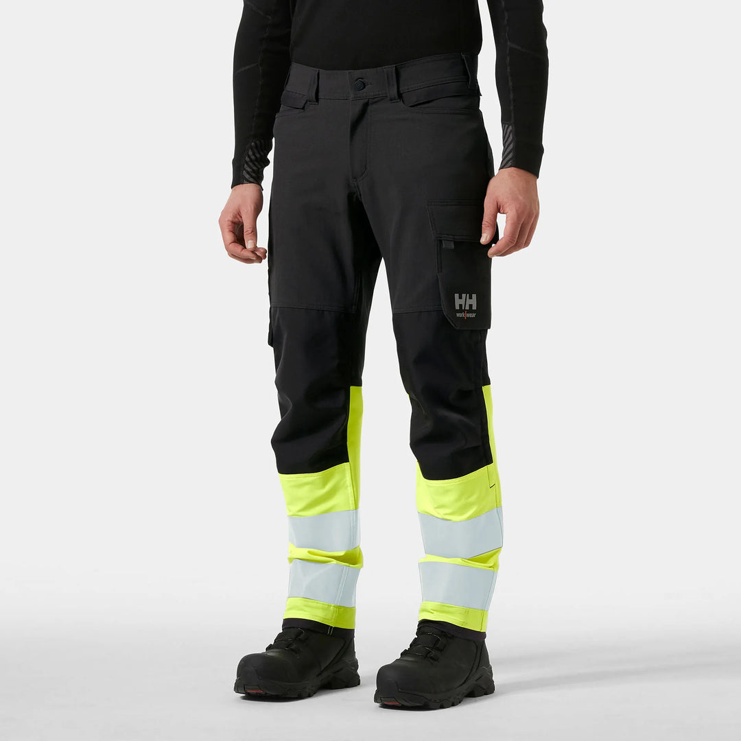 Helly Hansen Alna 4X HH Connect Hi-Vis Class 1 Cordura Reinforced 4-Way-Stretch Trousers 77340 Yellow/Ebony — Worn on Site 