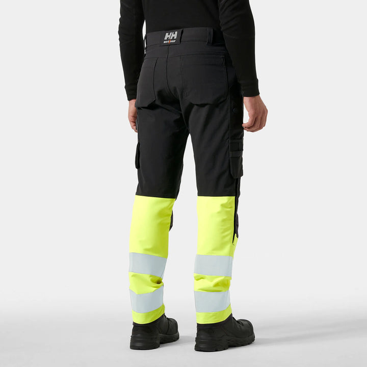 Helly Hansen Alna 4X HH Connect Hi-Vis Class 1 Cordura Reinforced 4-Way-Stretch Trousers 77340 Yellow/Ebony — Worn on Site 