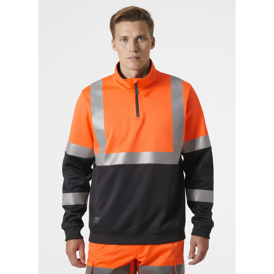 Helly Hansen Addvis Half Zip Hi-Vis Sweatshirt Class 1 Orange/Ebony OnBody 1#colour_orange-ebony