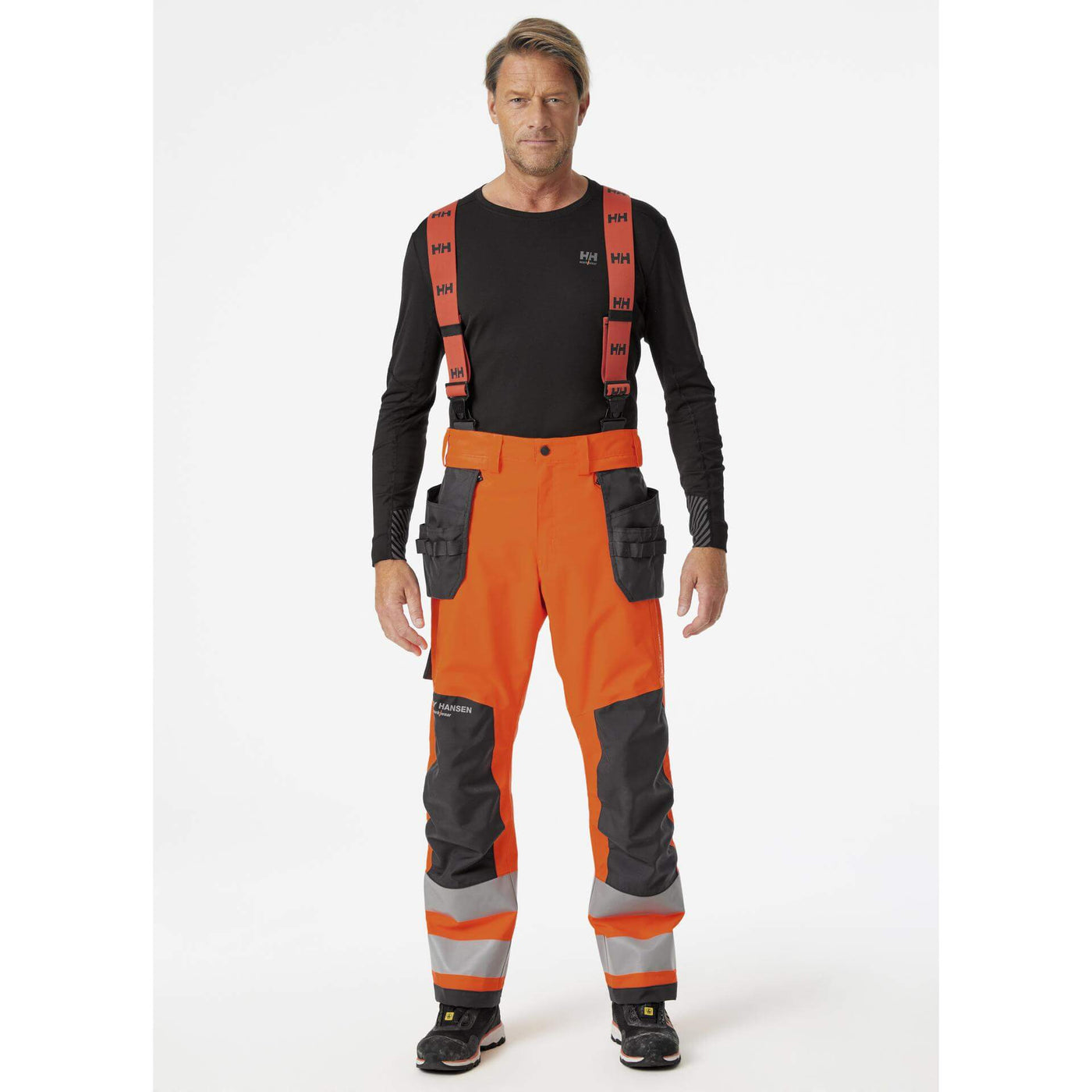 Helly Hansen Alna 2.0 Hi Vis Waterproof Shell Construction Bib and Brace Trousers Class 2 Orange/Ebony 3 On Body 1#colour_orange-ebony