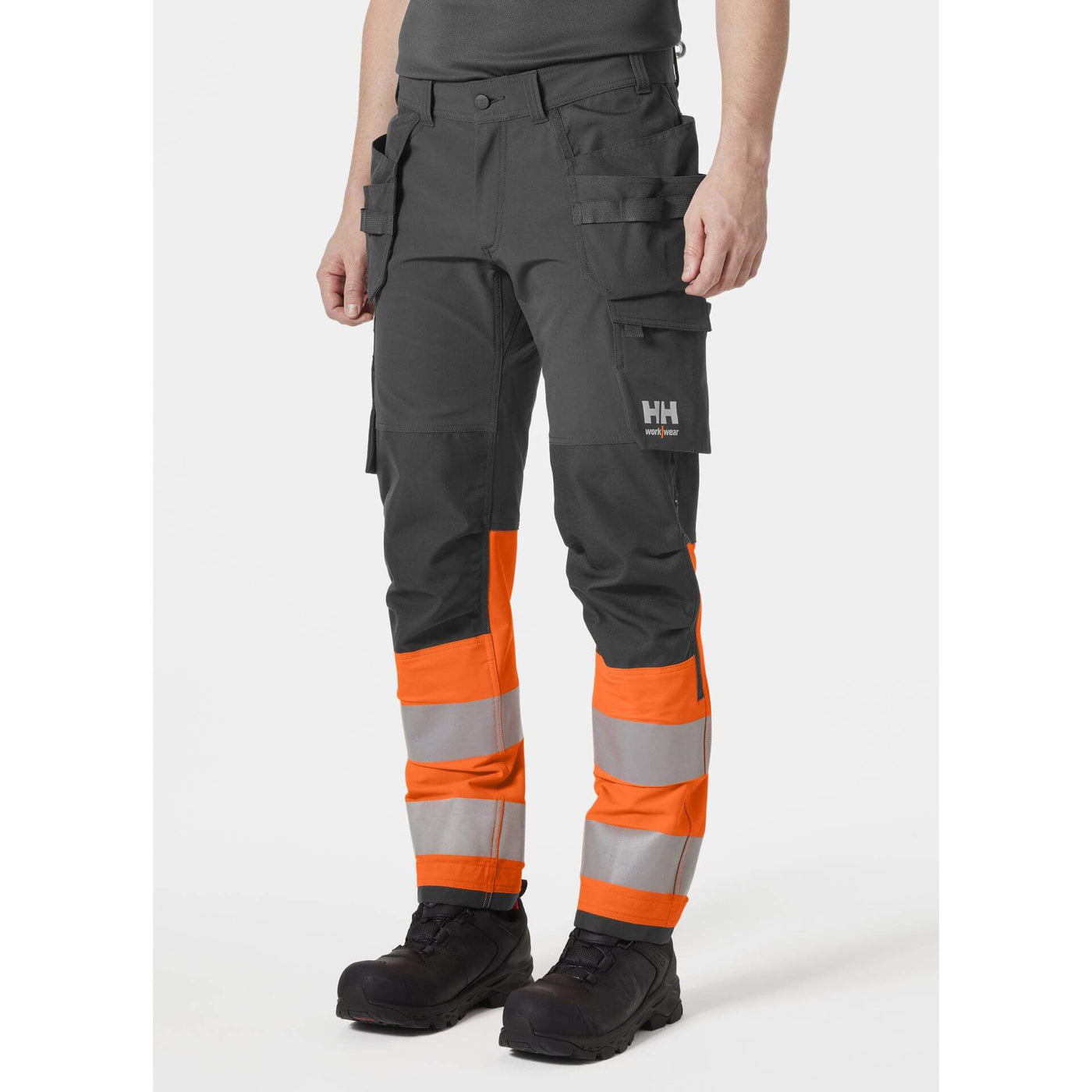 Helly Hansen Alna 4X Hi-Vis 4-Way-Stretch Construction Trousers Class 1 Orange/Ebony OnBody 1#colour_orange-ebony