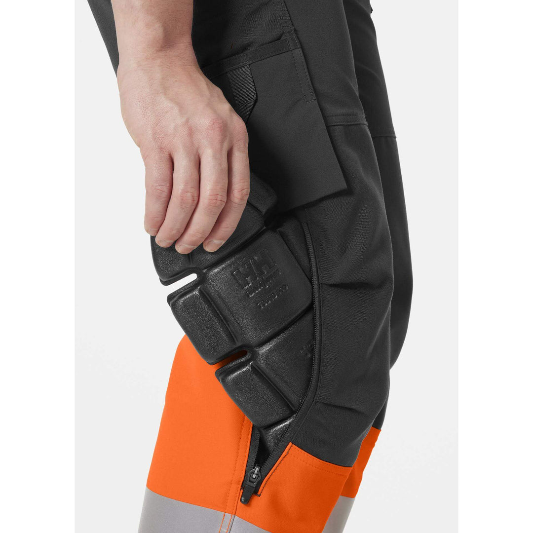 Helly Hansen Alna 4X Hi-Vis 4-Way-Stretch Construction Trousers Class 1 Orange/Ebony Feature 2#colour_orange-ebony