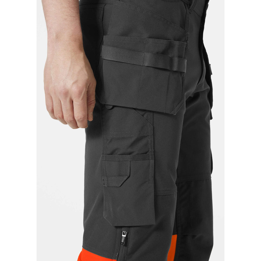 Helly Hansen Alna 4X Hi-Vis 4-Way-Stretch Construction Trousers Class 1 Orange/Ebony Feature 3#colour_orange-ebony