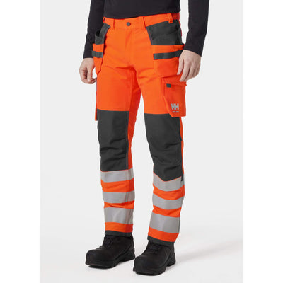 Helly Hansen Alna 4X Hi-Vis 4-Way-Stretch Construction Trousers Class 2 Orange/Ebony OnBody 1#colour_orange-ebony