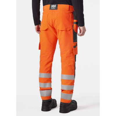 Helly Hansen Alna 4X Hi-Vis 4-Way-Stretch Construction Trousers Class 2 Orange/Ebony OnBody 2#colour_orange-ebony