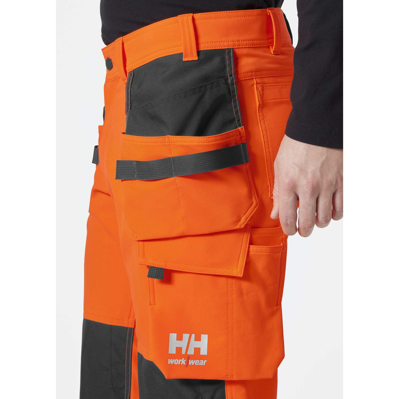Helly Hansen Alna 4X Hi-Vis 4-Way-Stretch Construction Trousers Class 2 Orange/Ebony Feature 1#colour_orange-ebony