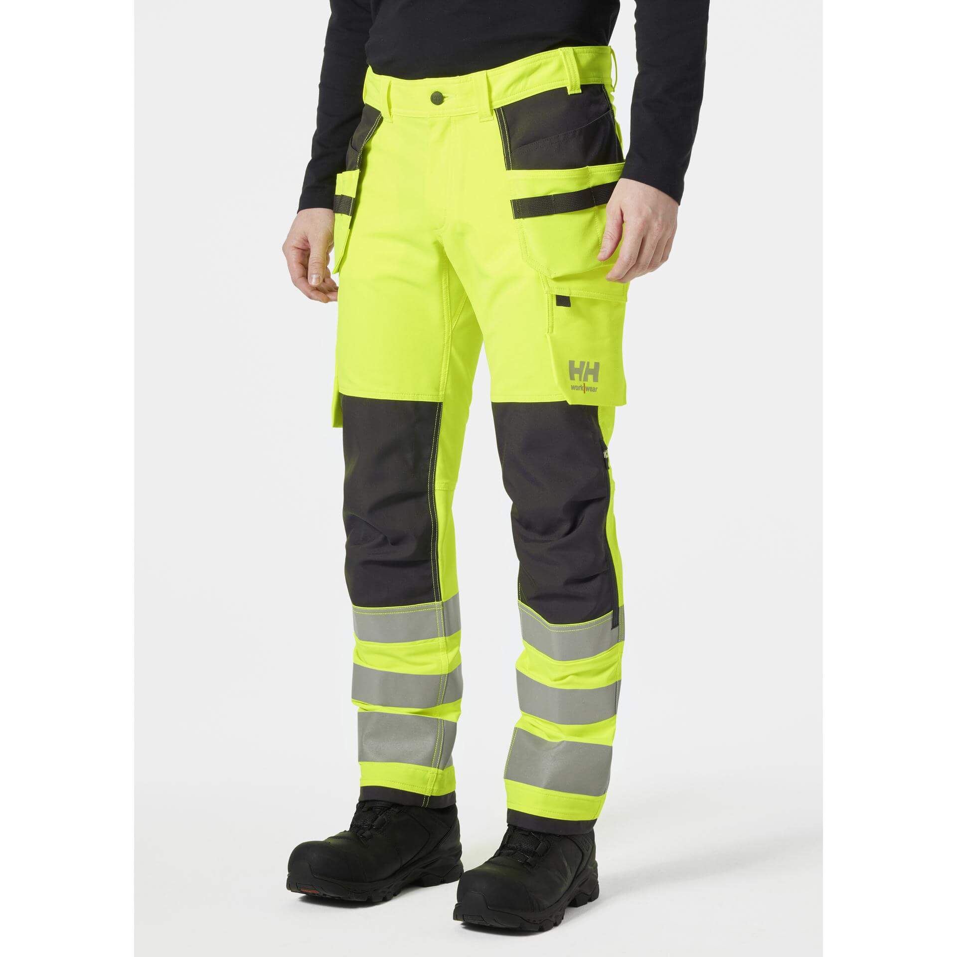 Helly Hansen Alna 4X Hi-Vis 4-Way-Stretch Construction Trousers Class 2 Yellow/Ebony OnBody 1#colour_yellow-ebony