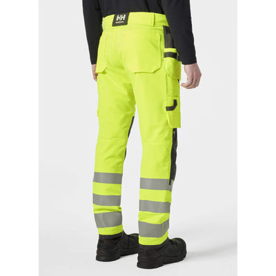 Helly Hansen Alna 4X Hi-Vis 4-Way-Stretch Construction Trousers Class 2 Yellow/Ebony OnBody 2#colour_yellow-ebony