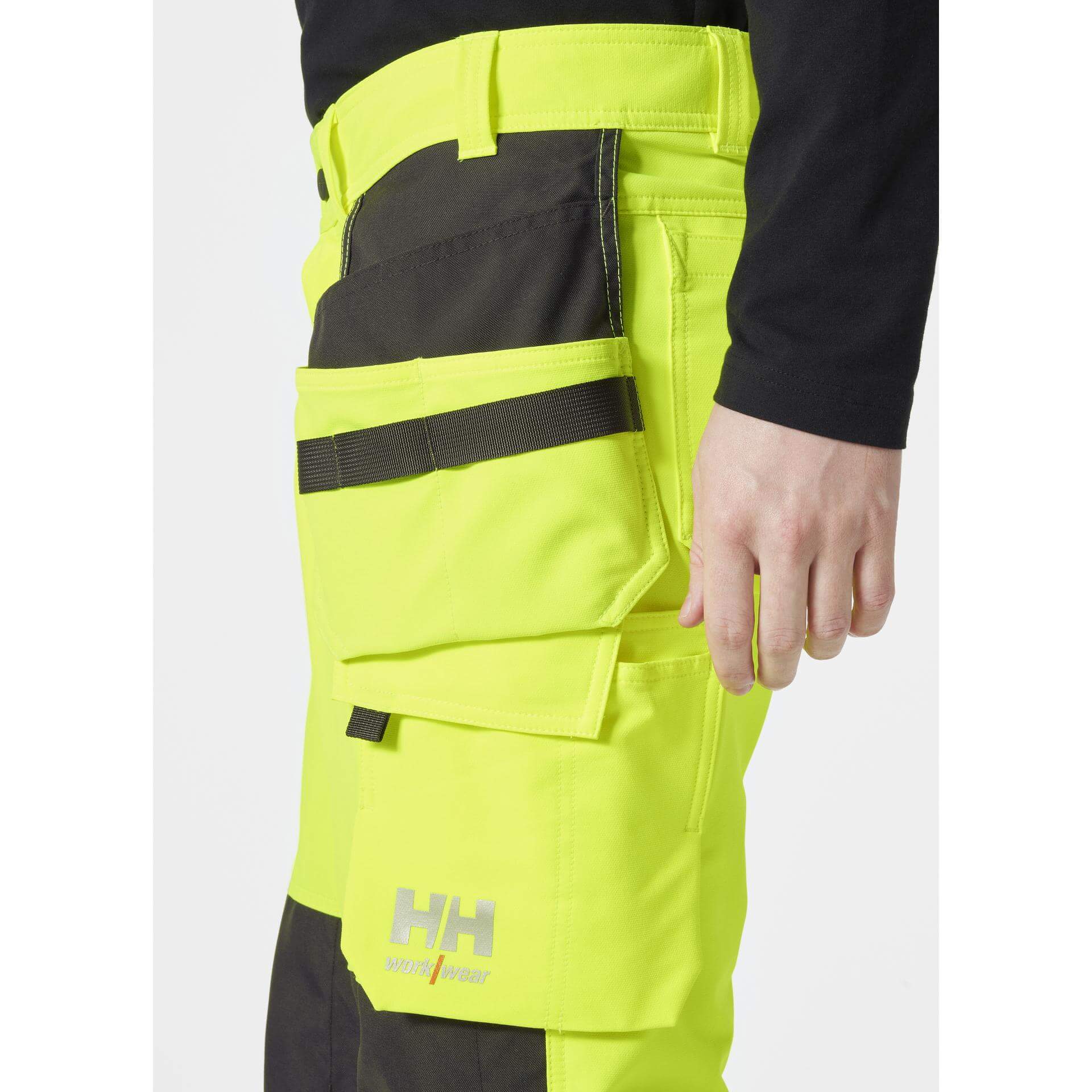 Helly Hansen Alna 4X Hi-Vis 4-Way-Stretch Construction Trousers Class 2 Yellow/Ebony Feature 1#colour_yellow-ebony